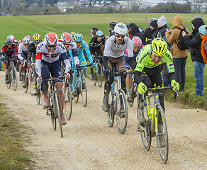 Image showing The Peloton on a Dirty Road - Paris-Nice 2016