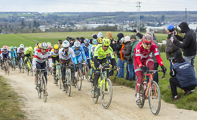 Image showing The Peloton on a Dirty Road - Paris-Nice 2016