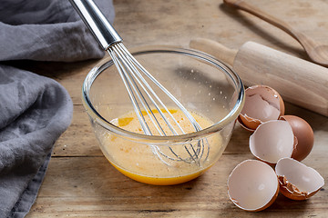 Image showing bowl of bitten eggs and sugar