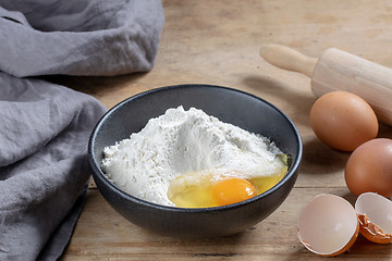 Image showing bowl of flour and egg