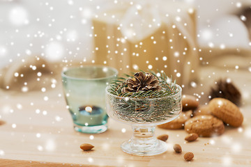 Image showing christmas fir decoration with cone in dessert bowl