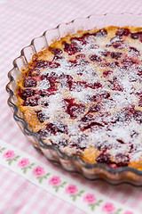 Image showing Cherry clafoutis. Traditional Frensch milk pie with cherry