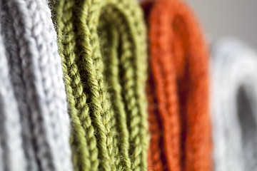 Image showing Orange, green and grey wool knitted texture