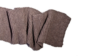 Image showing knitted brown wool scarf 