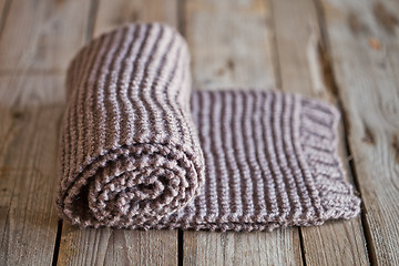 Image showing Hand knitted brown scarf 