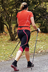 Image showing Woman in the park - Nordic walking