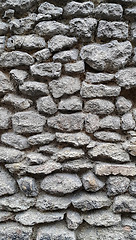 Image showing Rough wall lined with large cobblestones