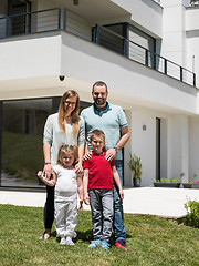 Image showing happy family with children in the yard