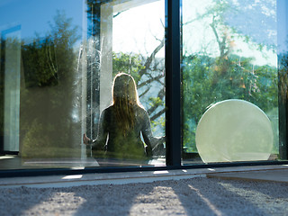 Image showing young woman doing morning yoga exercises