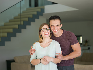 Image showing couple hugging in their new home