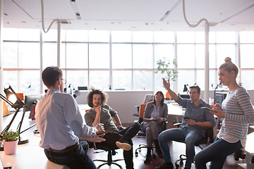 Image showing Young Business Team At A Meeting at modern office building