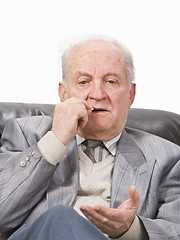 Image showing Senior man taking medication