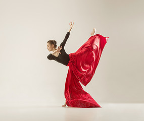 Image showing Modern ballet dancer dancing in full body on white studio background.