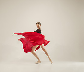 Image showing Modern ballet dancer dancing in full body on white studio background.