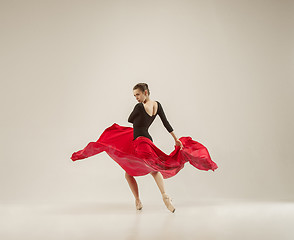 Image showing Modern ballet dancer dancing in full body on white studio background.