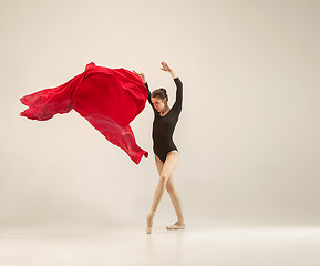 Image showing Modern ballet dancer dancing in full body on white studio background.