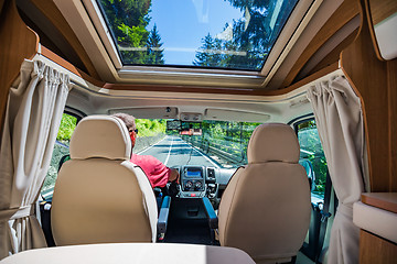 Image showing Man driving on a road in the Camper Van RV