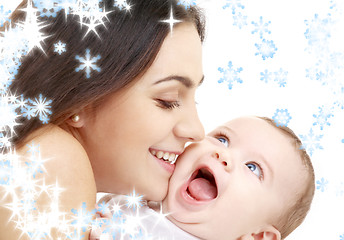 Image showing playful mama with happy baby