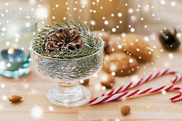 Image showing christmas fir decoration with cone in dessert bowl