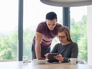 Image showing couple enjoying morning coffee and strawberries