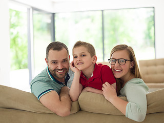 Image showing family with little boy enjoys in the modern living room