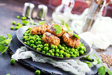 Image showing green peas with cutlets