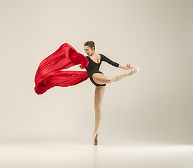 Image showing Modern ballet dancer dancing in full body on white studio background.