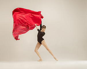 Image showing Modern ballet dancer dancing in full body on white studio background.