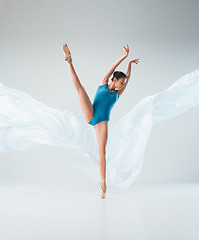 Image showing Modern ballet dancer dancing in full body on white studio background.