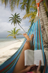 Image showing Woman Reading in a Hammock