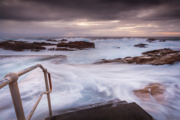 Image showing Coastal pool overflow in big seas