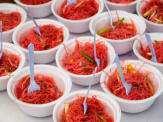 Image showing Pink noodles in styrofoam bowls