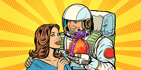 Image showing Couple in love. Astronaut gives a woman Mars