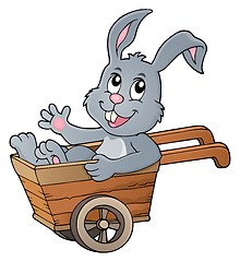 Image showing Easter bunny in wheelbarrow image 1