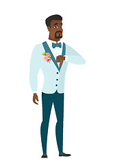 Image showing Disappointed african groom with thumb down.