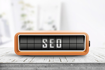 Image showing SEO message sign alarm clock in a bright room