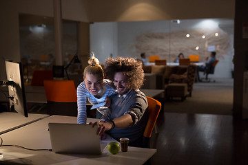 Image showing young designers in the night office