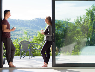 Image showing couple on the door of their luxury home villa