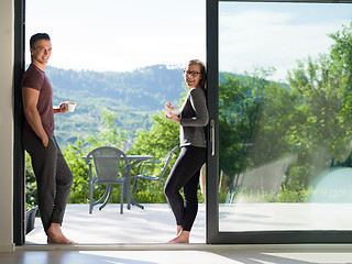 Image showing couple on the door of their luxury home villa