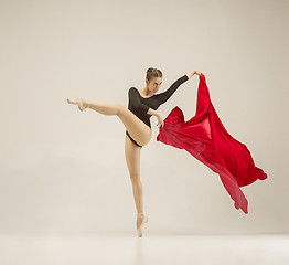 Image showing Modern ballet dancer dancing in full body on white studio background.