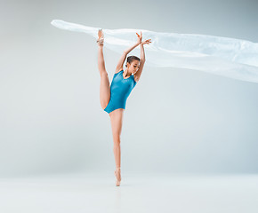 Image showing Modern ballet dancer dancing in full body on white studio background.