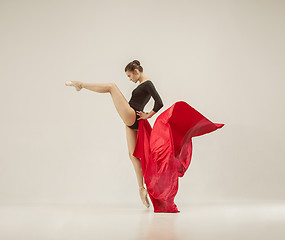 Image showing Modern ballet dancer dancing in full body on white studio background.