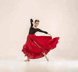 Image showing Modern ballet dancer dancing in full body on white studio background.