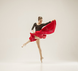 Image showing Modern ballet dancer dancing in full body on white studio background.