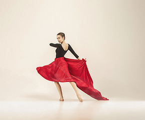 Image showing Modern ballet dancer dancing in full body on white studio background.