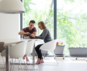 Image showing couple enjoying morning coffee and strawberries