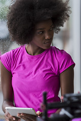 Image showing african american woman using tablet