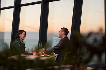 Image showing Couple on a romantic dinner at the restaurant