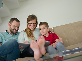 Image showing family with little boy enjoys in the modern living room