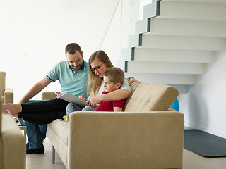 Image showing family with little boy enjoys in the modern living room